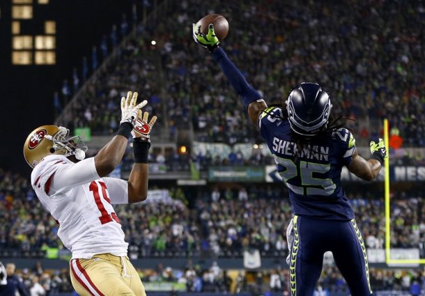 Not sure why Sherman deflected this pass. Crabtree's so mediocre, he'd have tipped it to a Seahawk anyway. (USA Today)